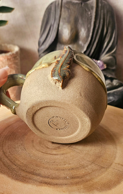Wunderschöne Federtasse
